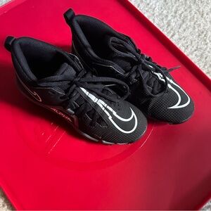 Nike Kids Black and White football cleats 2Y